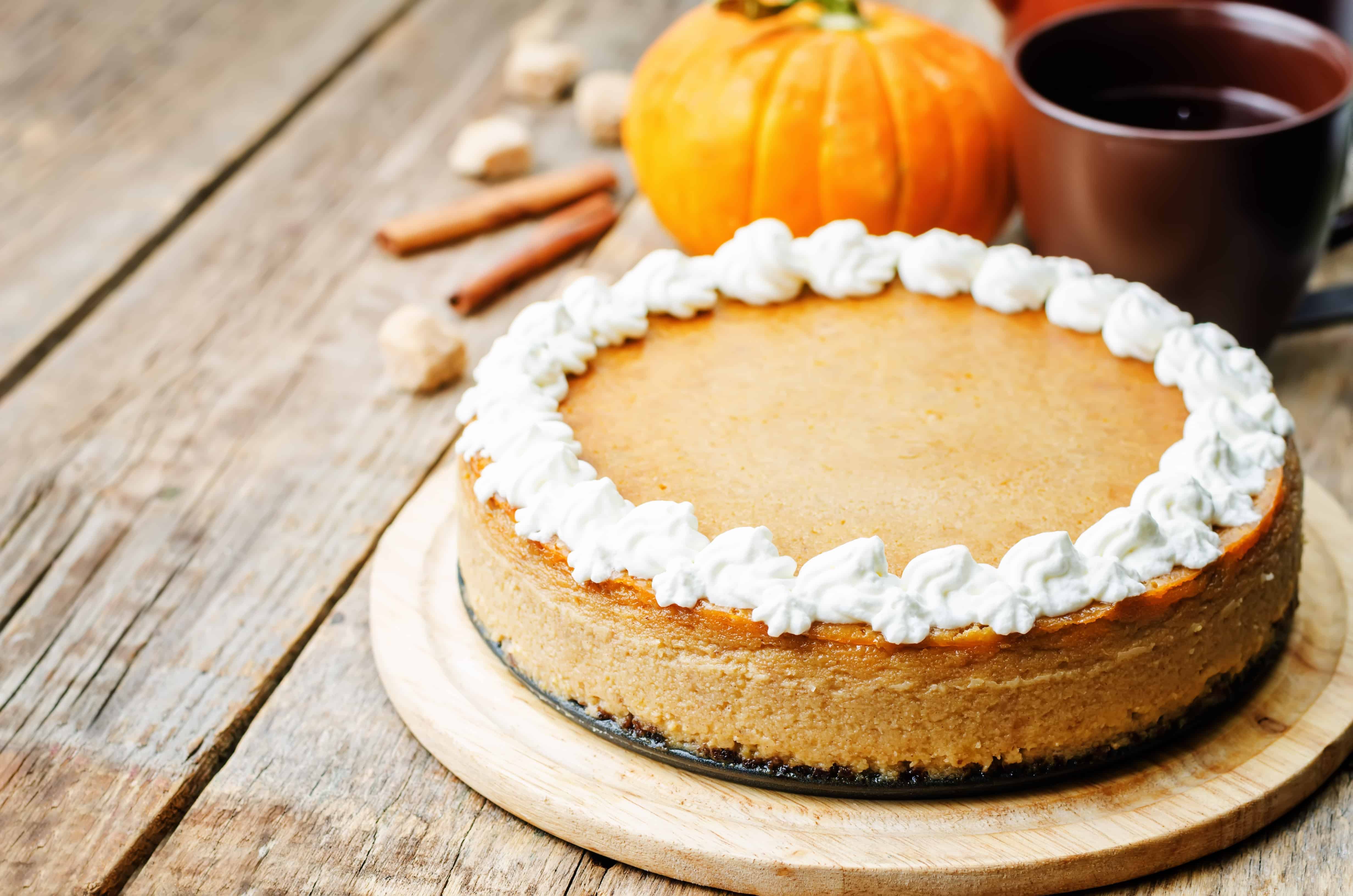 pumpkin cheesecake decorated with whipped cream. the toning. selective focus